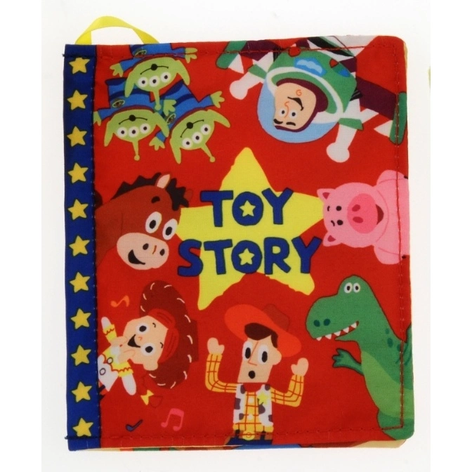 Toy Story soft book with characters like Woody, Buzz, and Rex on a red background.
