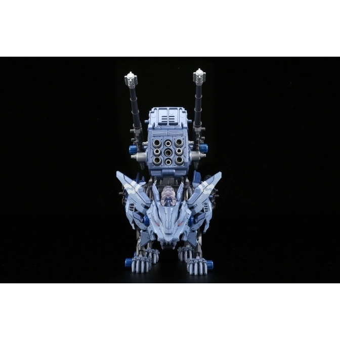  Blue Zoids Liger Zero toy with missile launcher and cannons on its back, standing on a black surface.
