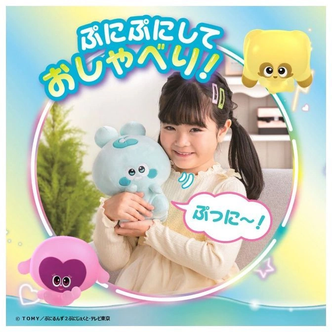  Girl holding a light blue plush toy with pink and yellow floating character toys.