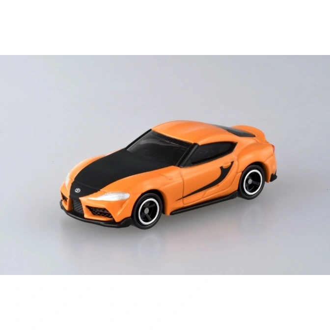 Orange and black toy Toyota Supra car with detailed features.