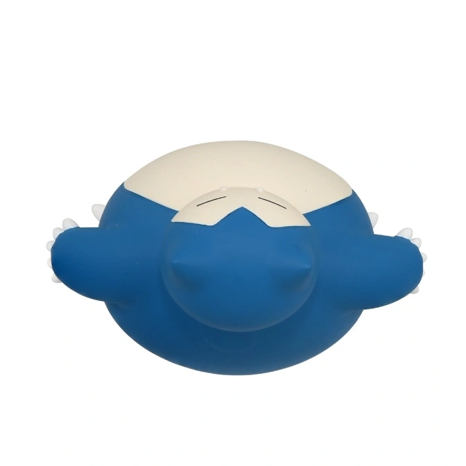 Blue Snorlax toy lying on its back with its eyes closed.