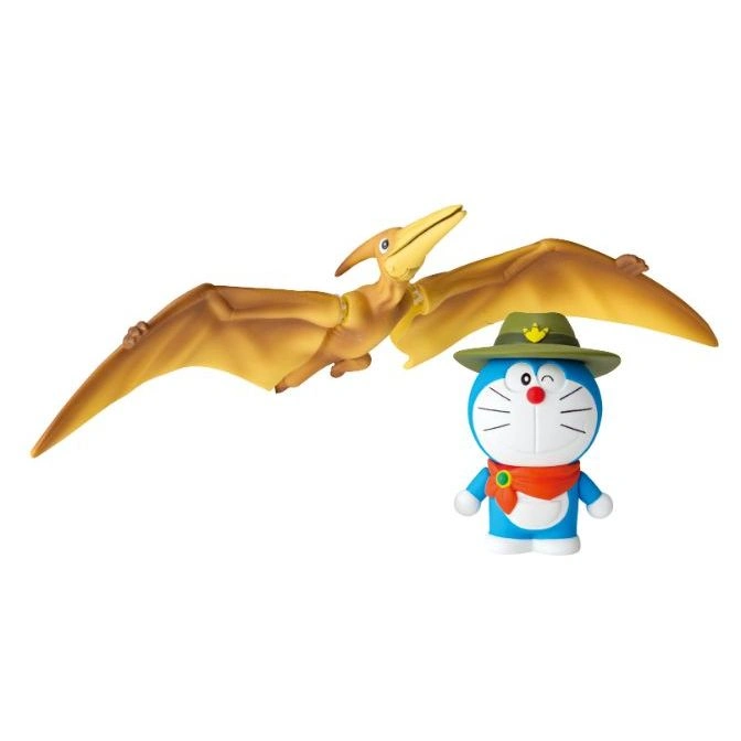 Doraemon figure in a hat with a Pteranodon toy.