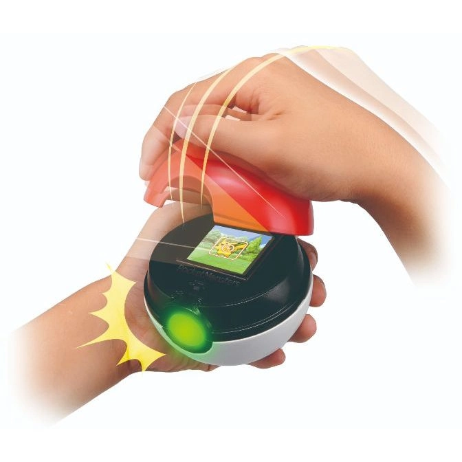  Pokémon toy with screen and button, being activated by a hand.