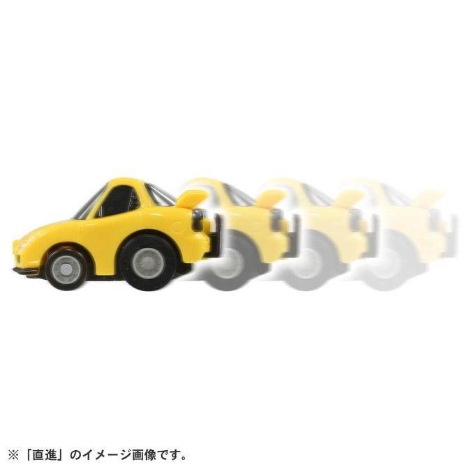  Yellow toy car in motion, showing a blurred effect of speed.