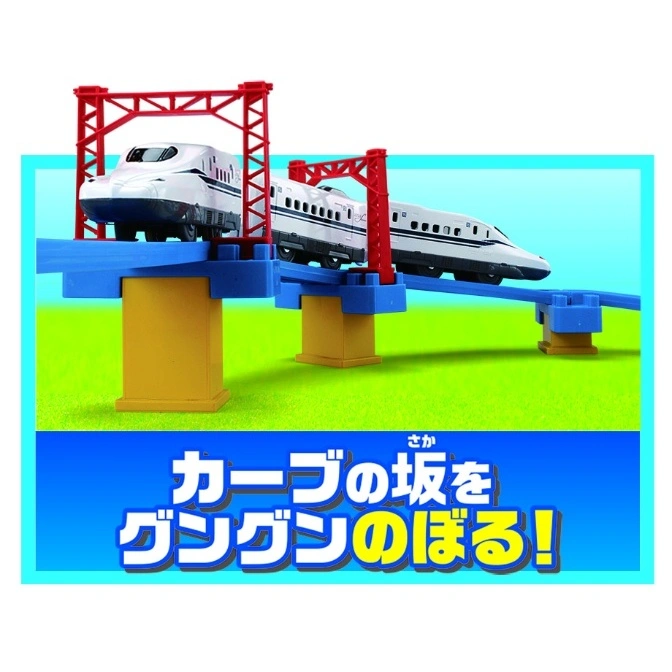  Toy bullet train on a blue track with red supports and yellow pillars, against a green and blue background.