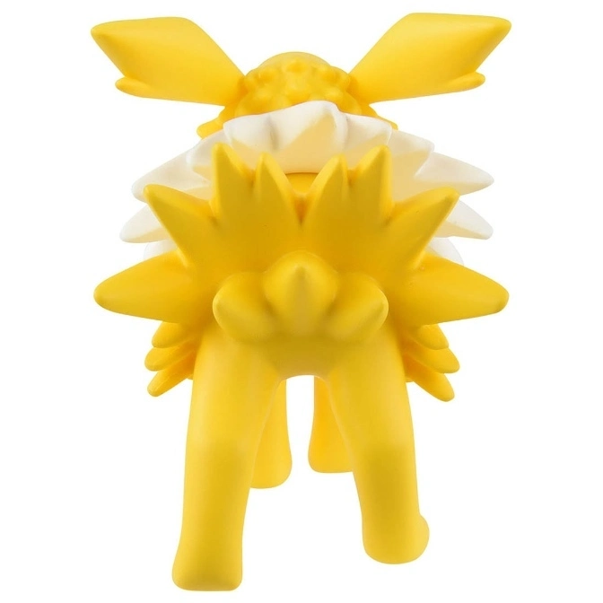  Yellow toy figure with spiky details and four legs, viewed from the back.