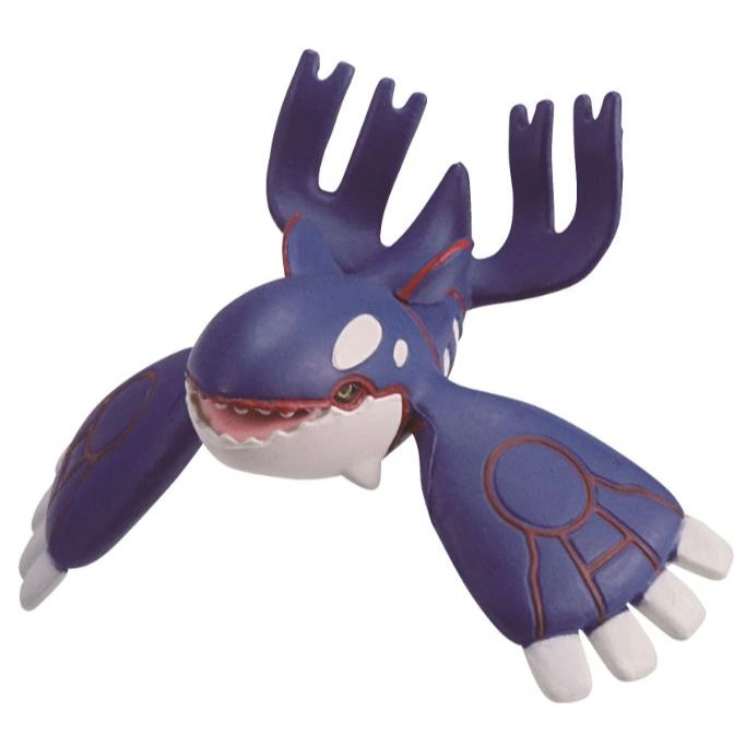 Kyogre toy figure with blue skin, white spots, and fin-like appendages.