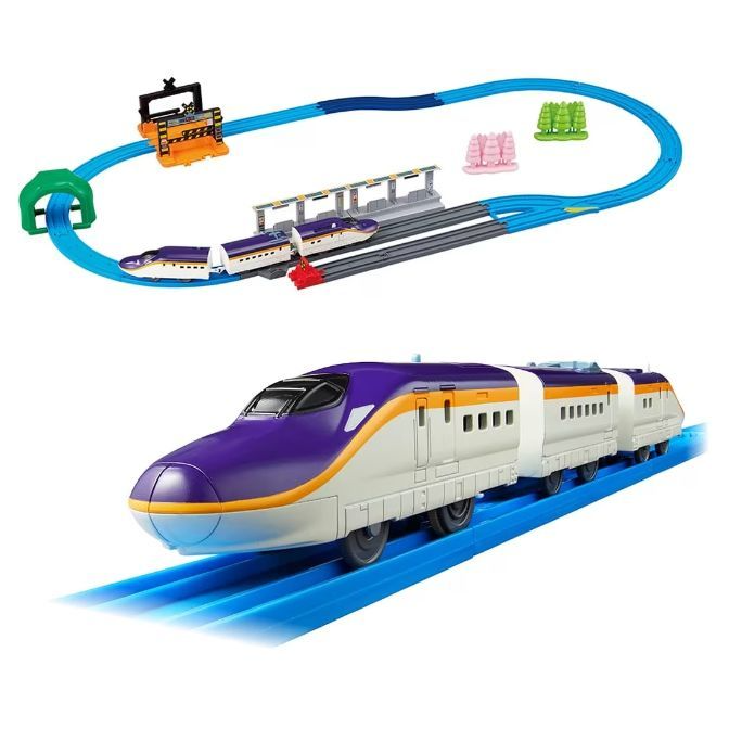 A toy train set with a purple and white bullet train on blue tracks.