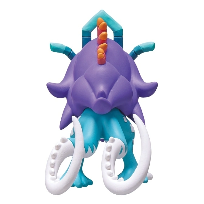 Purple and blue toy monster with white tentacles and orange spikes.