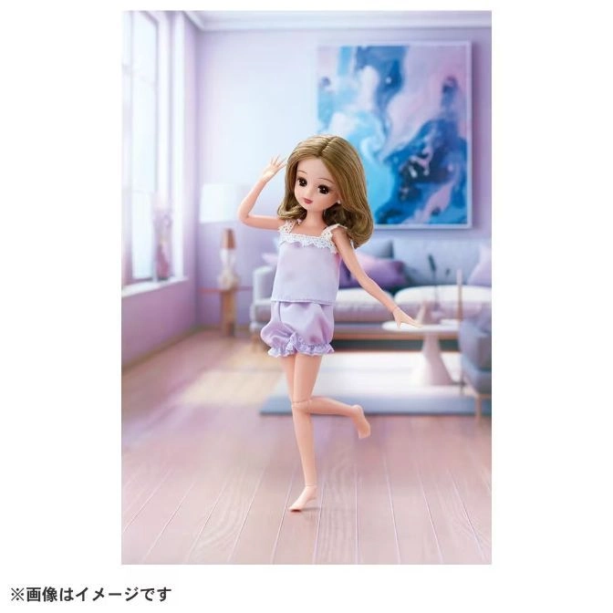  Licca-chan doll in lavender pajamas strikes a pose in a living room setting.
