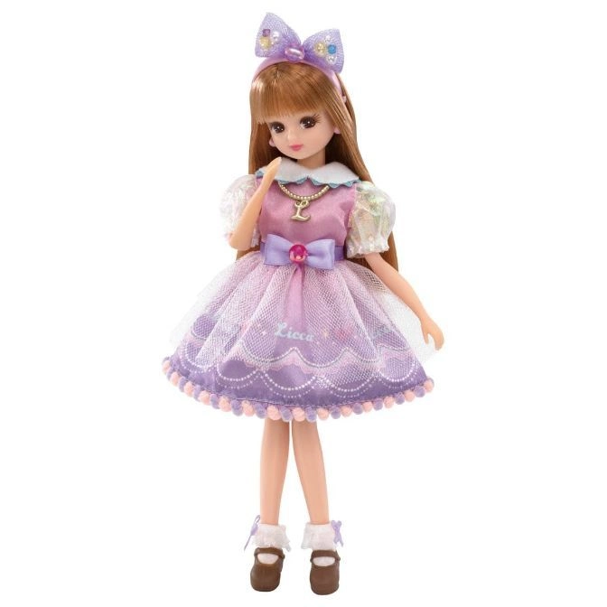  Licca doll in a purple dress with a bow headband and brown shoes.