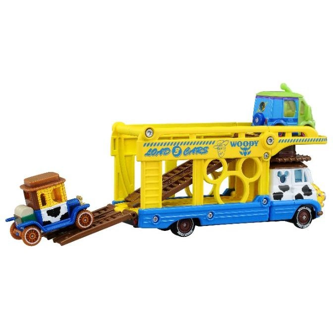  Toy Story car carrier with Woody's car being loaded onto the trailer.