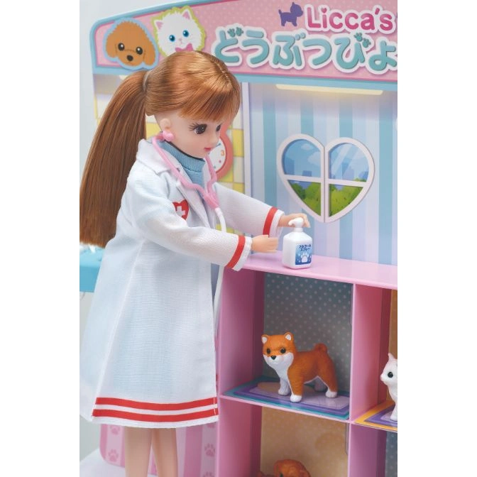  Licca doll as vet with toy pets in a pink vet clinic playset.