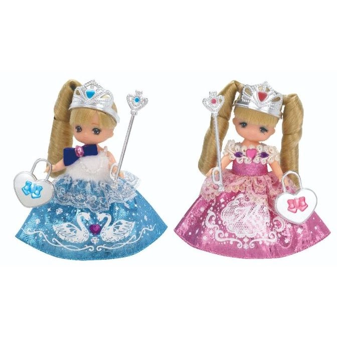 Two princess dolls with crowns, wands, and heart-shaped purses in blue and pink dresses.