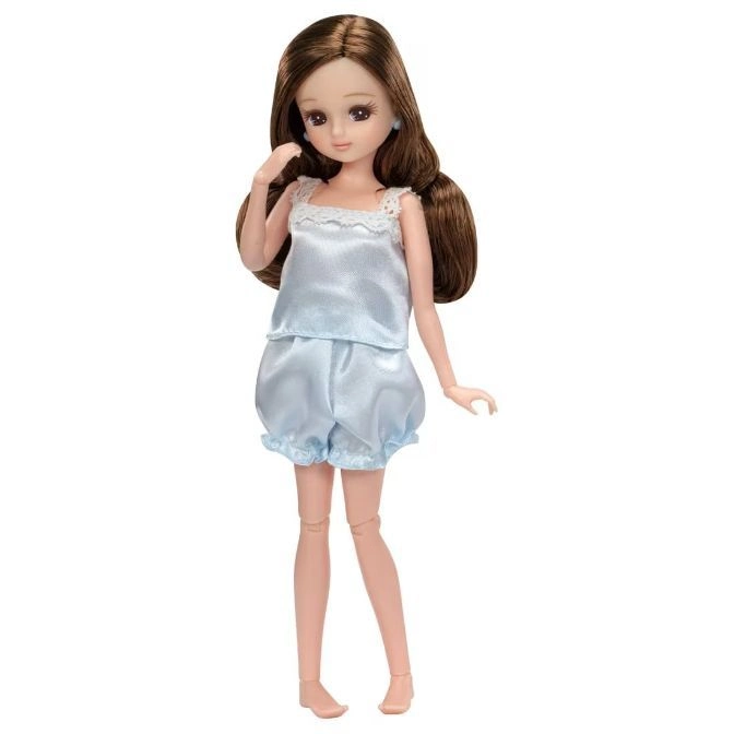 Doll with brown hair wearing blue pajamas.