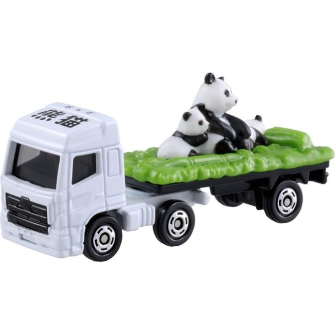 Toy truck carrying pandas on a green platform.