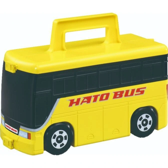 Yellow toy Hato Bus with a handle on top and black windows.
