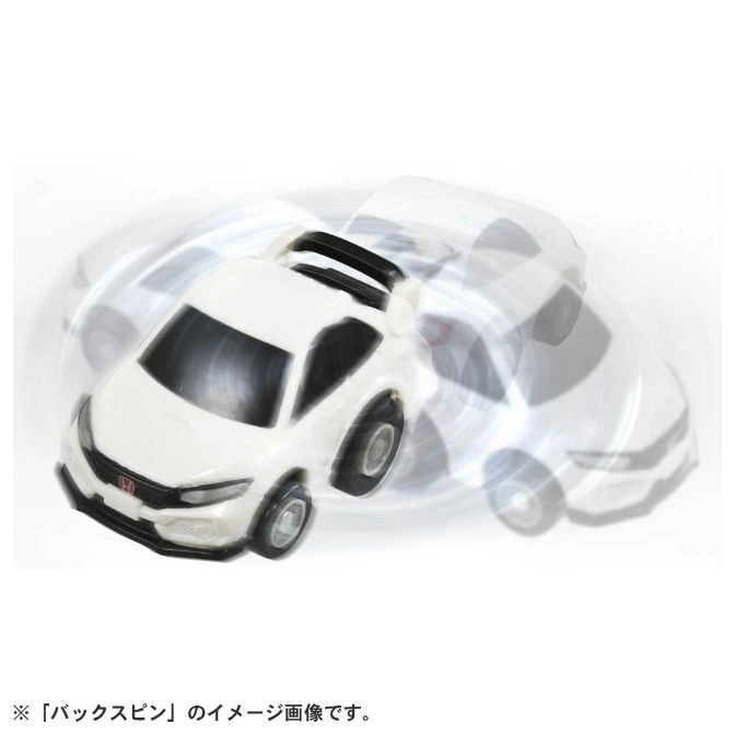  White toy car spinning, showing motion blur. Features a black spoiler and Honda logo.