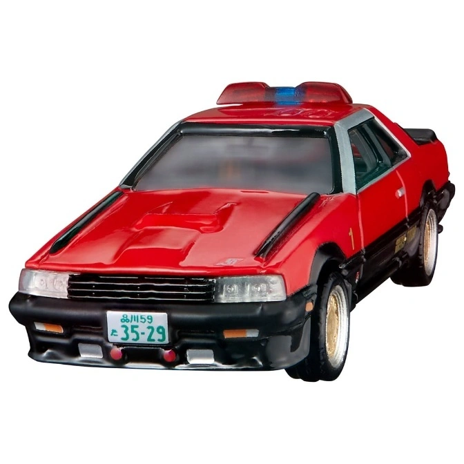  Red toy police car with light bar and Japanese license plate.