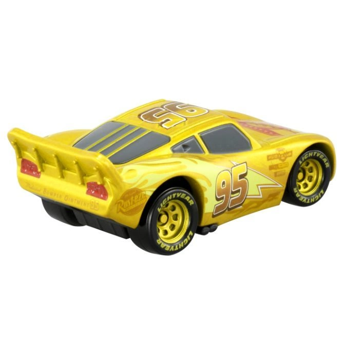  Gold Lightning McQueen toy car with number 95 and Lightyear tires.
