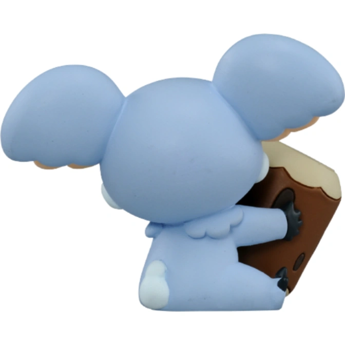  Blue koala toy holding a brown block with beige trim.