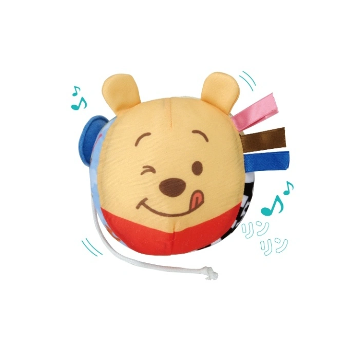  Winnie the Pooh plush cube toy with ribbons and a pull string, winking with tongue out.