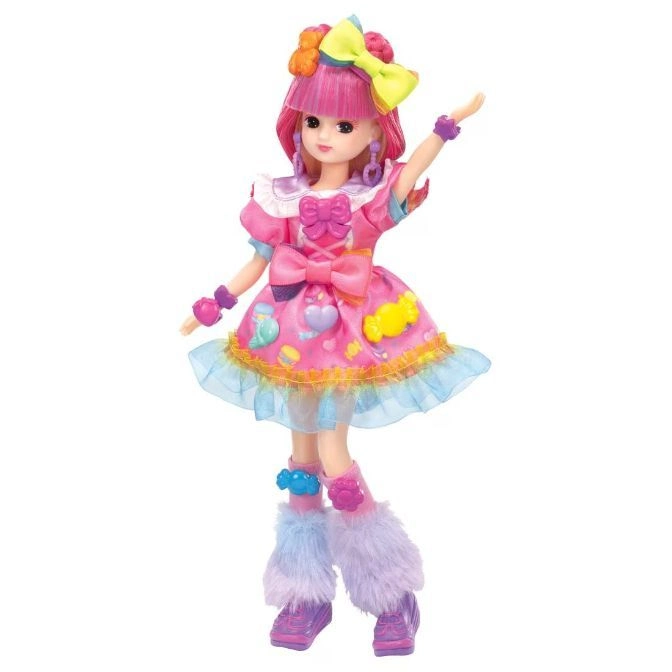  Pink-haired doll in a candy-themed dress with a bow, wristbands, and furry leg warmers.