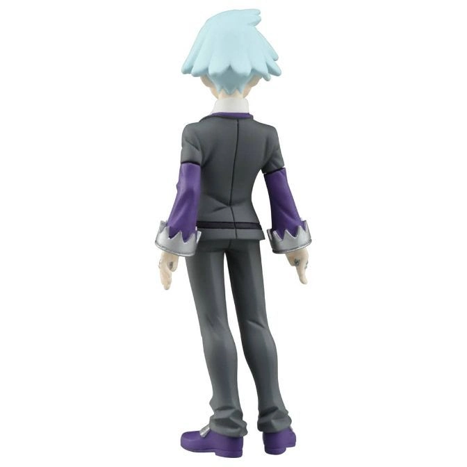  Back view of a Steven Stone figurine with light blue hair, wearing a gray suit with purple sleeves and matching shoes.