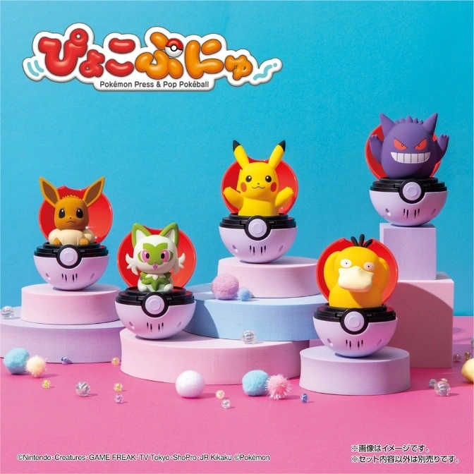  Pokémon Press & Pop Pokéball toys: Eevee, Sprigatito, Pikachu, Psyduck, and Gengar in Pokéballs on pastel platforms.