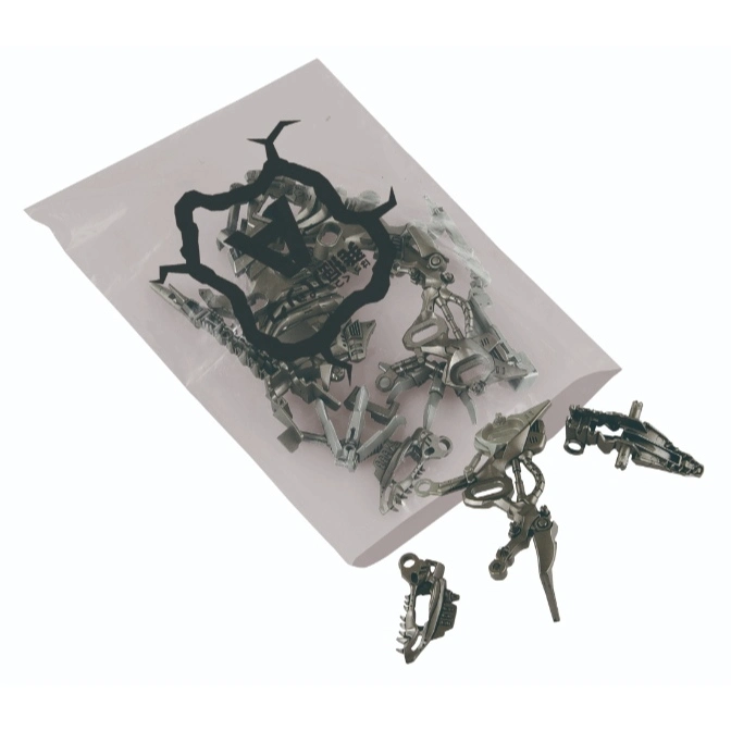  Silver robot toy parts in a plastic bag, some pieces outside the bag.