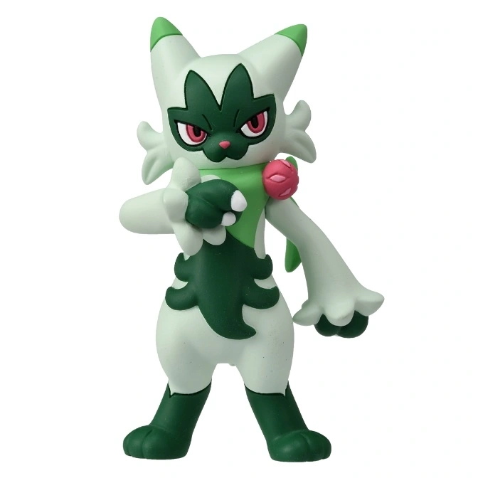 Sprigatito figurine with green and white fur, red eyes, and a flower on its chest.