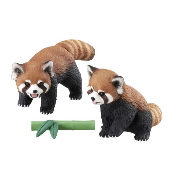 Two red panda figurines with bamboo. One is standing, the other is sitting.