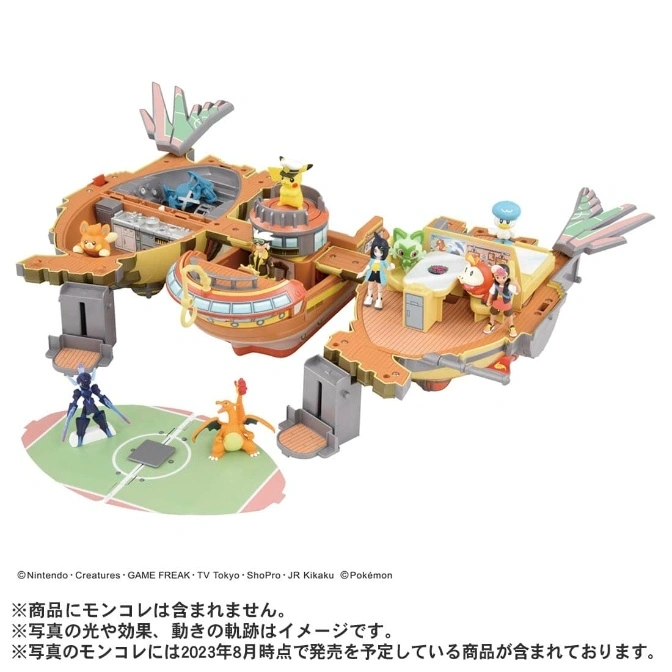  Pokémon playset with figures, including Pikachu, Charizard, and trainers, on a multi-level platform.