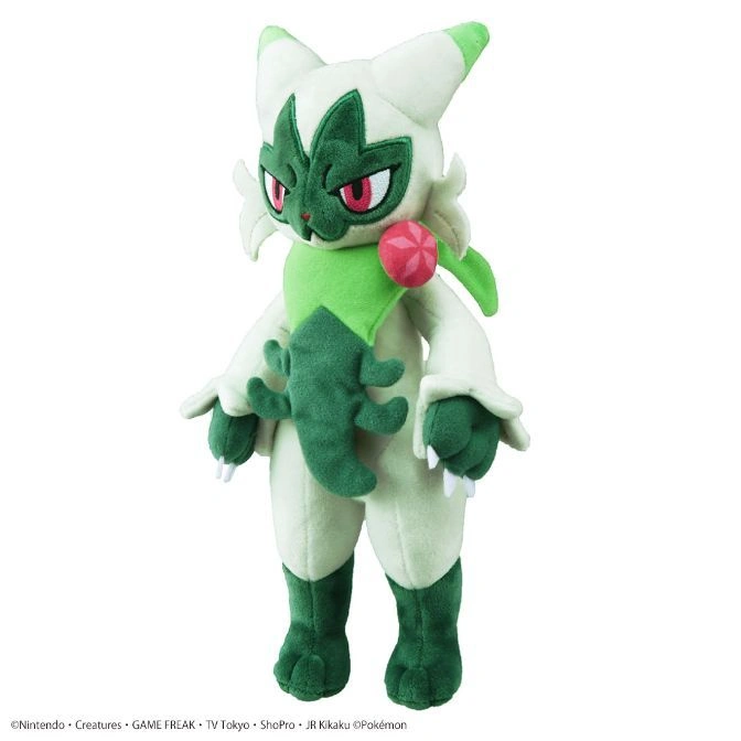 Sprigatito plush toy with green accents and red eyes.