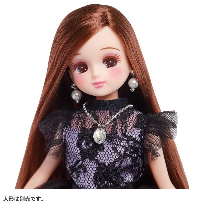  Licca doll with long brown hair, wearing a black lace dress, pearl earrings, and a necklace.