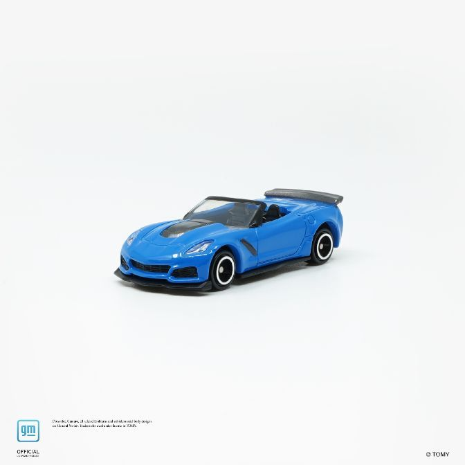  Blue toy Corvette convertible with black accents and spoiler.