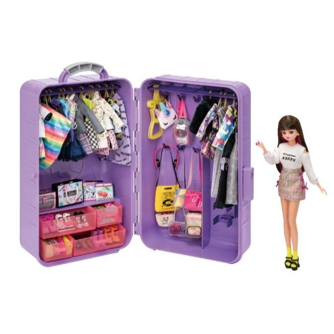 Open purple doll wardrobe suitcase with clothes, shoes, bags, and a doll figure.