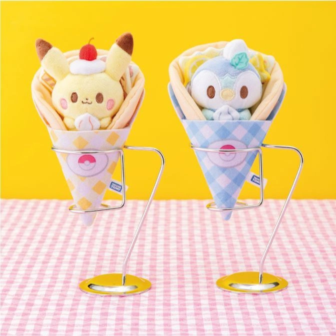  Pikachu and Piplup plush toys in crepe cones on stands, resembling desserts.