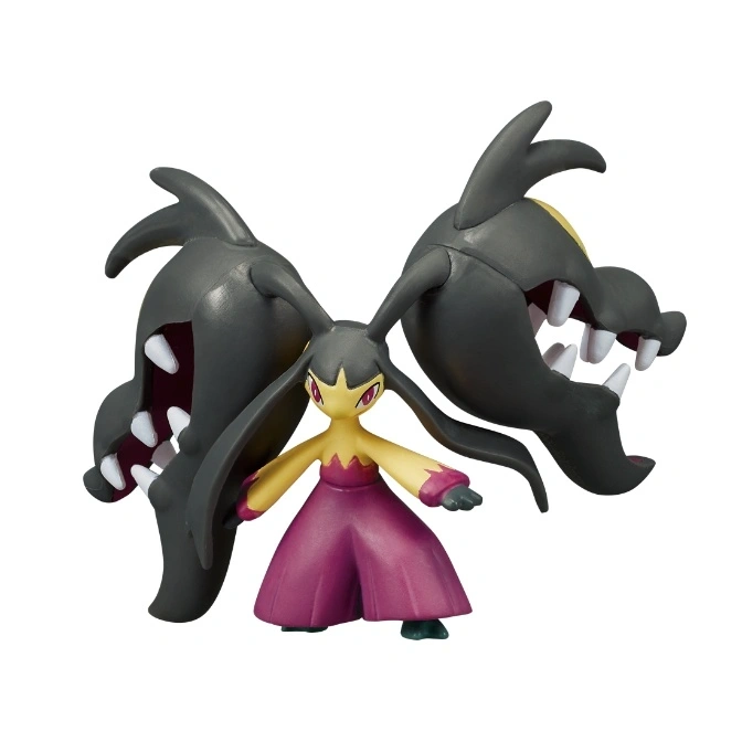 Mawile Pokémon toy figure with two large jaws and a small humanoid figure in the center.