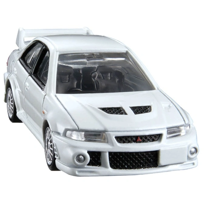  White Mitsubishi Lancer Evolution VI toy car with spoiler and detailed front grille.