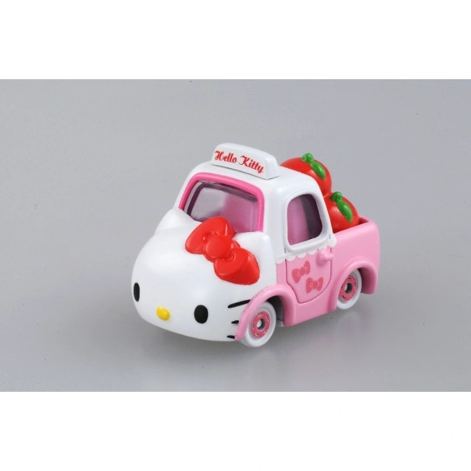 Hello Kitty toy truck with apples in the back.