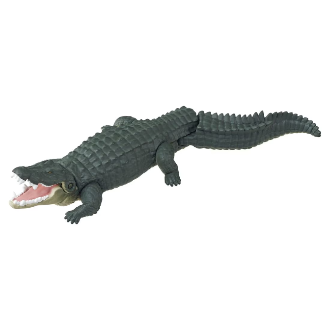Toy alligator with open mouth, textured skin, and segmented tail.