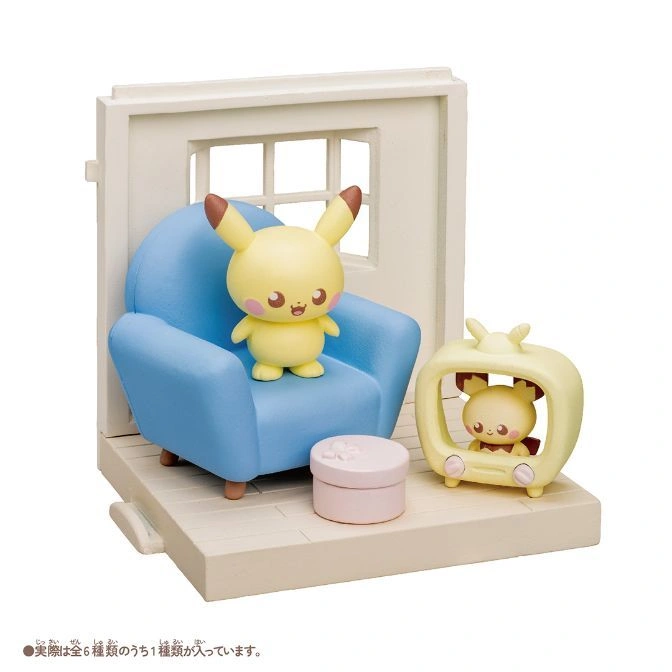 Pikachu-themed diorama with armchair, TV, and gift box.