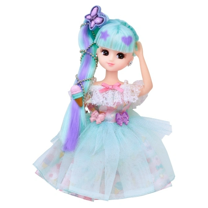  Doll with blue and purple hair, wearing a light blue dress with tulle overlay and butterfly hair clip.