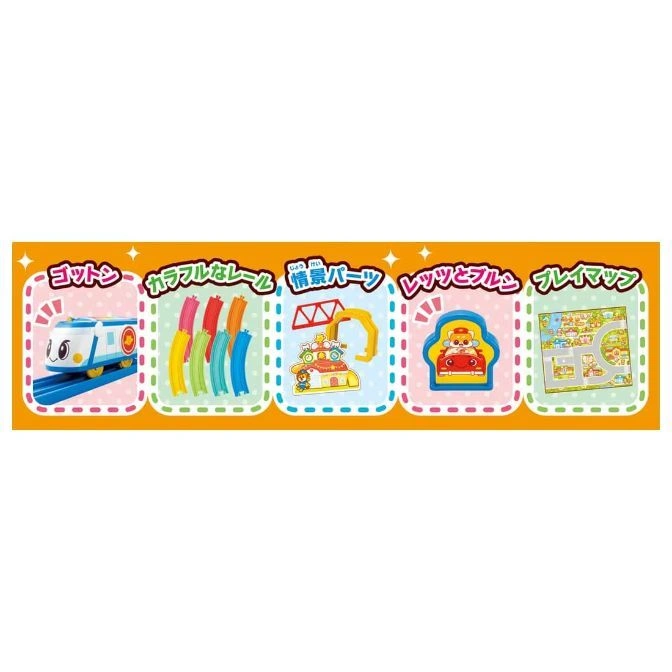  Toy train set with train, tracks, scenery, car, and playmat.