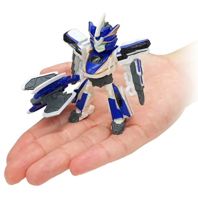  Blue and white robot toy with a weapon in hand, held in a human palm.