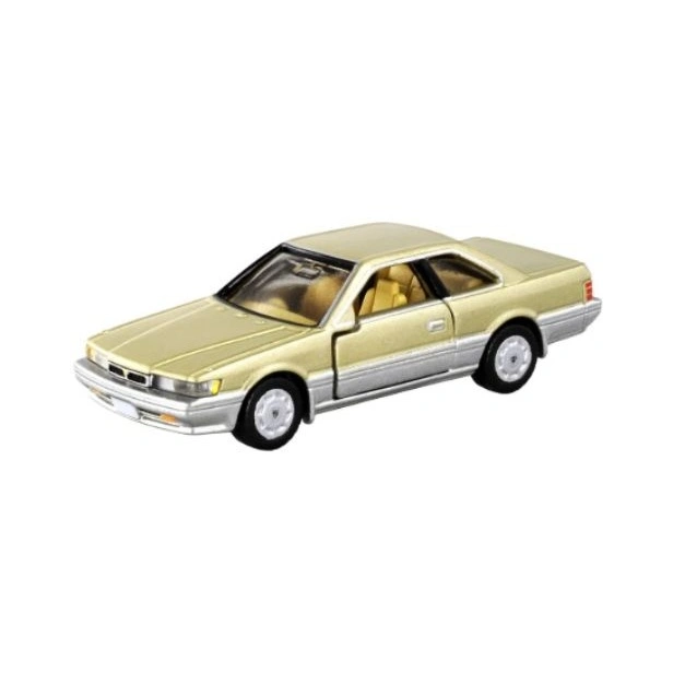Gold toy car with silver trim, a miniature replica.