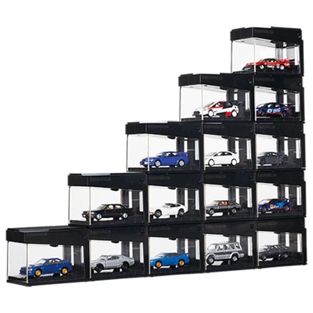 Staircase display case with Tomica diecast cars in individual compartments.