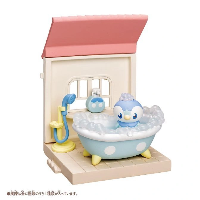  Piplup toy in a bathtub with bubbles, part of a playset with a shower and soap dispenser.