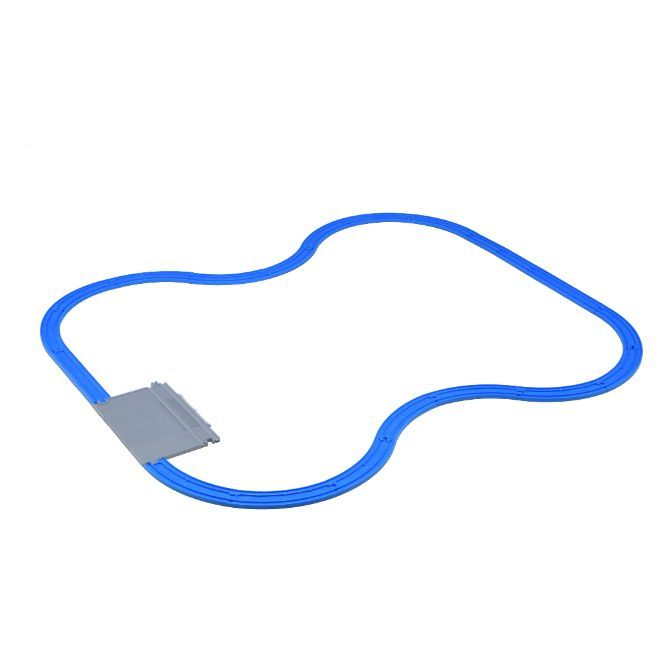  A blue toy train track is laid out in a loop on a white surface. The track has a gray bridge section.